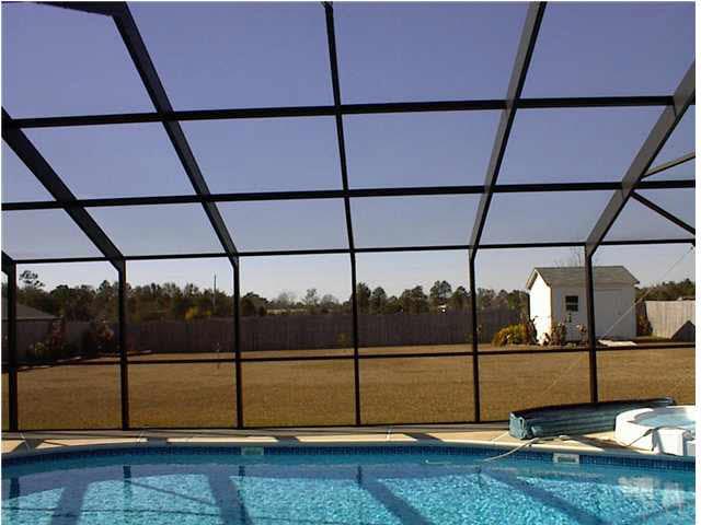 7477 Farmers Road Pensacola, FL 32526 - Photo 9 of 17 One of the Largest Lots in the Community -- with a Storage Building! and (note the extra sturdy screen enclosure -- Ivan tried & tested with no damage)