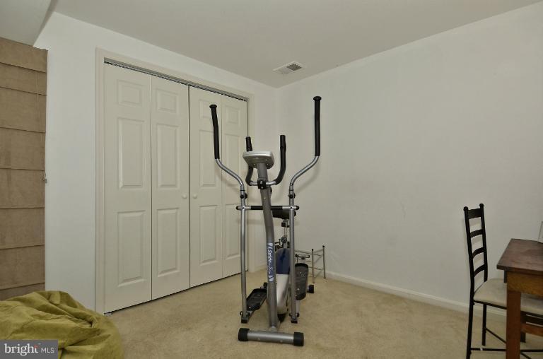 1544 Deer Point Way Reston, VA 20194 - Photo 4 of 27 a view of a room with gym equipment