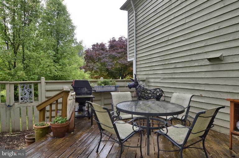 1544 Deer Point Way Reston, VA 20194 - Photo 7 of 27 a view of a chairs and table in the balcony