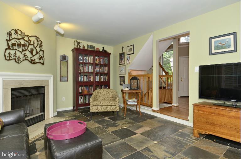 1544 Deer Point Way Reston, VA 20194 - Photo 8 of 27 a living room with furniture and a flat screen tv