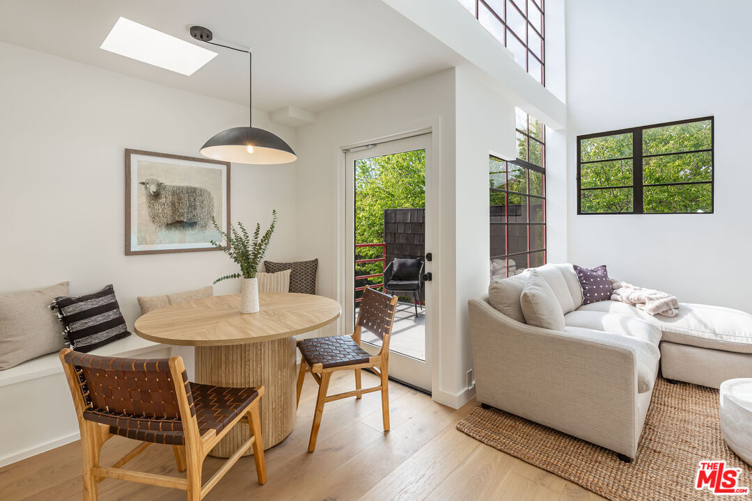 29233 Heathercliff Road, Unit 2 Malibu, CA 90265 - Photo 12 of 20 a living room with furniture and a window
