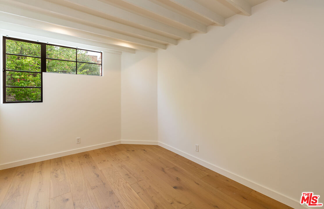 29233 Heathercliff Road, Unit 2 Malibu, CA 90265 - Photo 18 of 20 a view of an empty room with a window