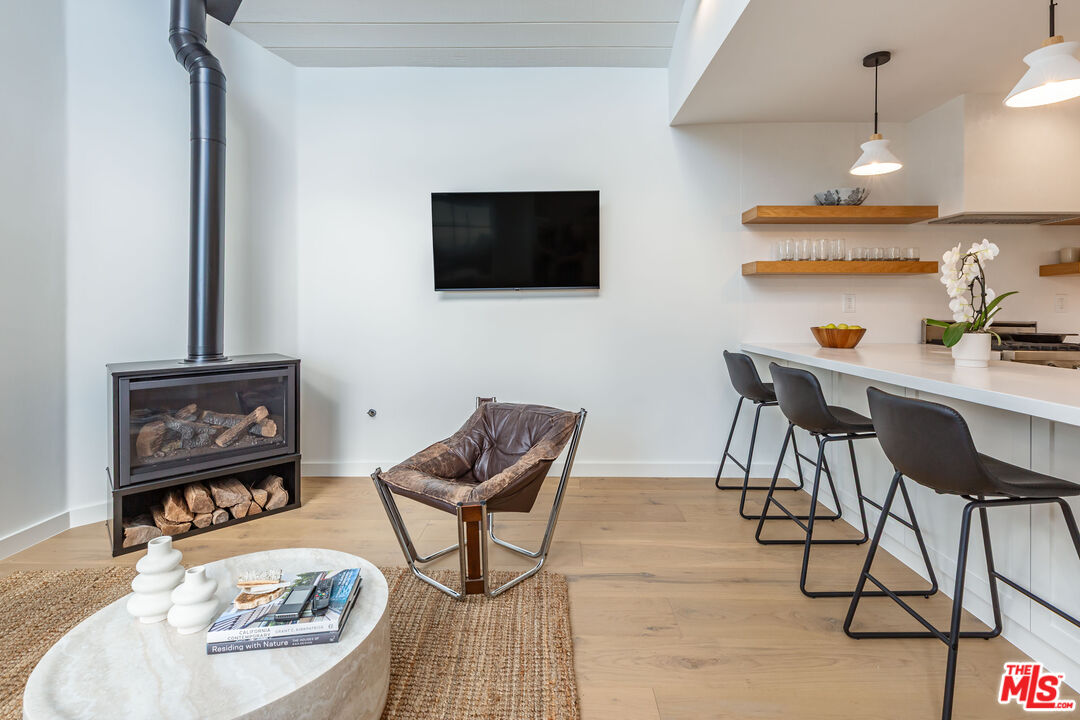 29233 Heathercliff Road, Unit 2 Malibu, CA 90265 - Photo 5 of 20 a view of a livingroom with furniture and a flat screen tv