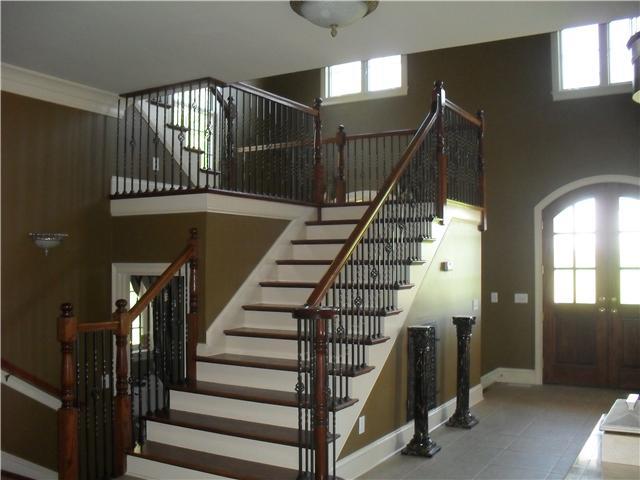 3330 Maxie Jones Road Springfield, TN 37172 - Photo 4 of 20 Elegant stairway with wood and wrought iron leading to the 2nd floor