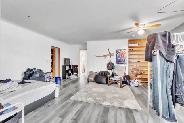 a view of a livingroom with furniture and a living room