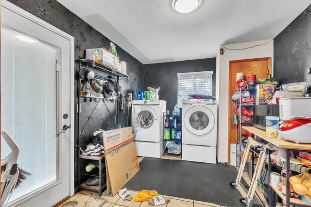 a storage room with washer and dryer