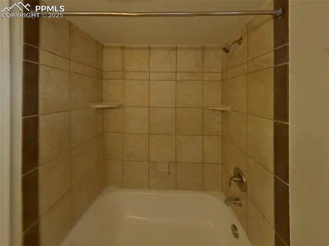 a bathroom with a sink toilet and mirror