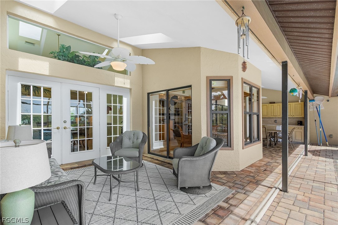 7747 Grande Pine Road Bokeelia, FL 33922 - Photo 32 of 45 a outdoor space with patio furniture