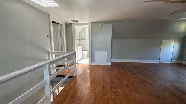 a view of entryway with wooden floor