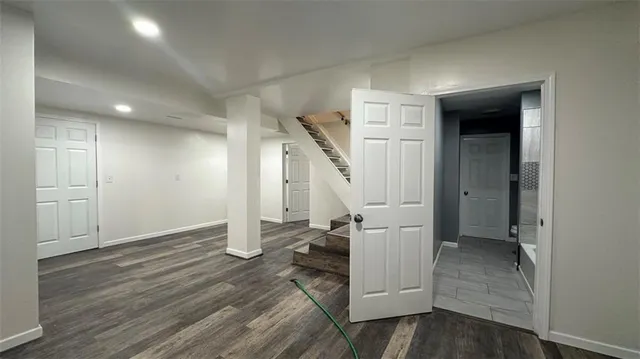 a view of entryway with wooden floor
