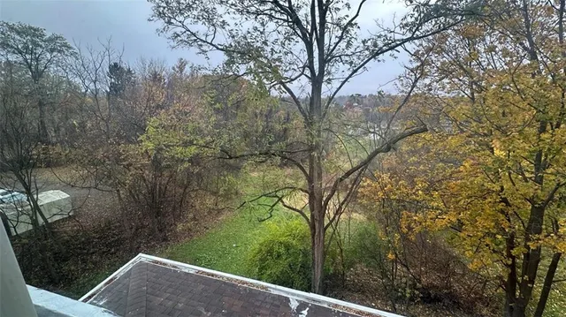 a view of balcony with two chairs