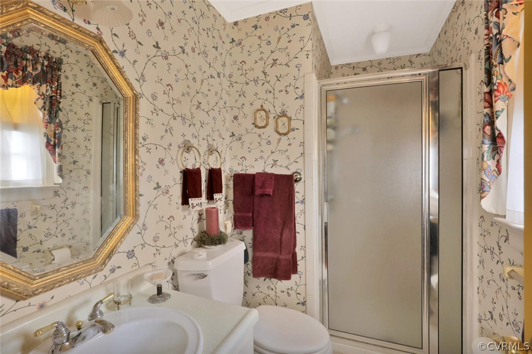 3300 Wood Dale Road Chester, VA 23831 - Photo 15 of 28 a bathroom with a sink toilet and shower