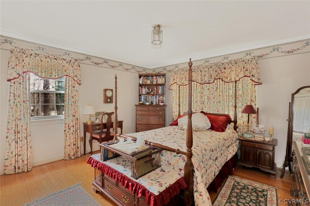 3300 Wood Dale Road Chester, VA 23831 - Photo 18 of 28 a bed room with a bed and a table