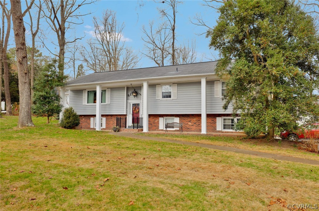 3300 Wood Dale Road Chester, VA 23831 - Photo 2 of 28 a view of a yard in front of house