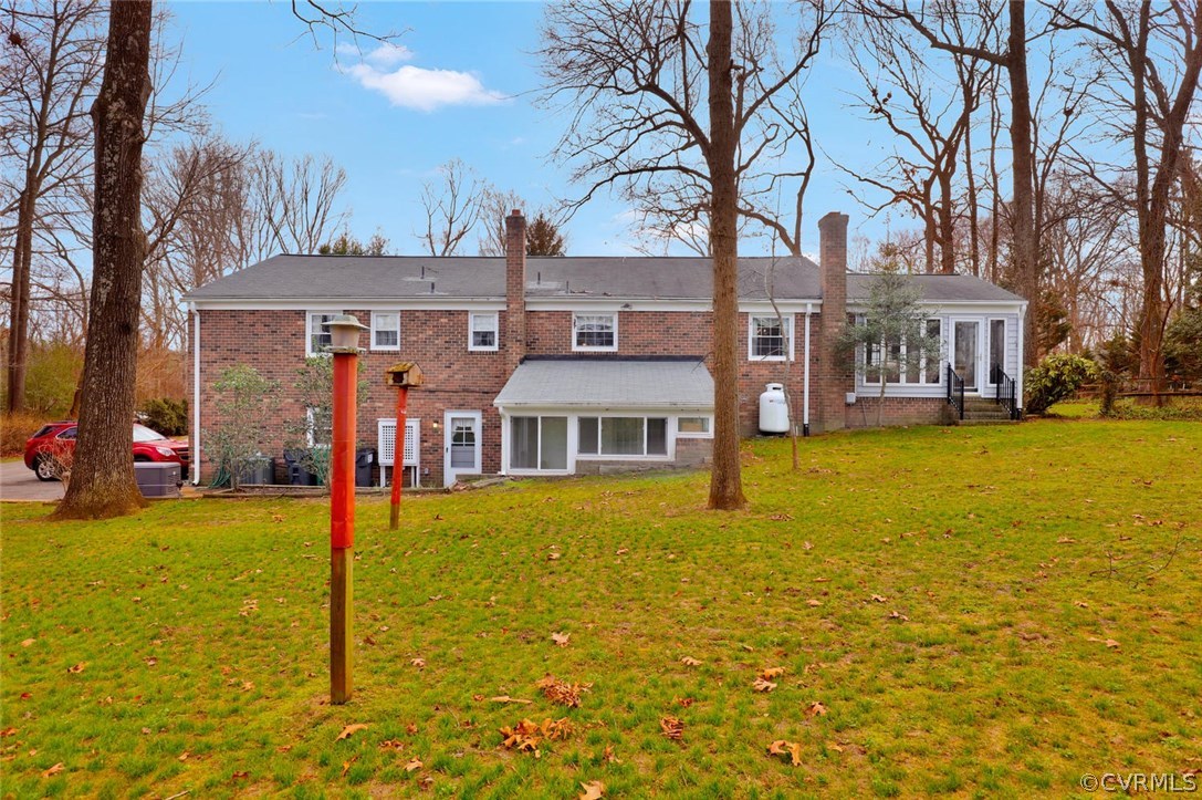 3300 Wood Dale Road Chester, VA 23831 - Photo 28 of 28 a front view of a house with a yard