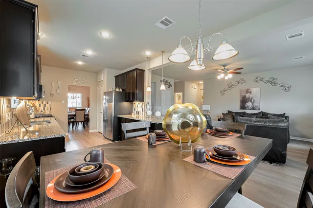 a room with furniture and a flat screen tv