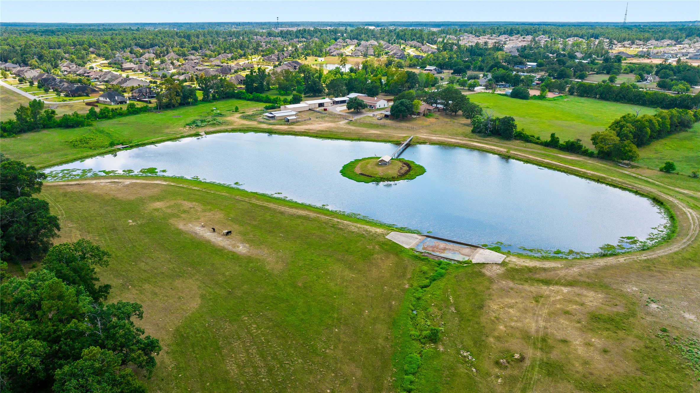 41115 Community Road Magnolia, TX 77354 - Photo 12 of 28 an aerial view of a house with yard swimming pool and outdoor seating