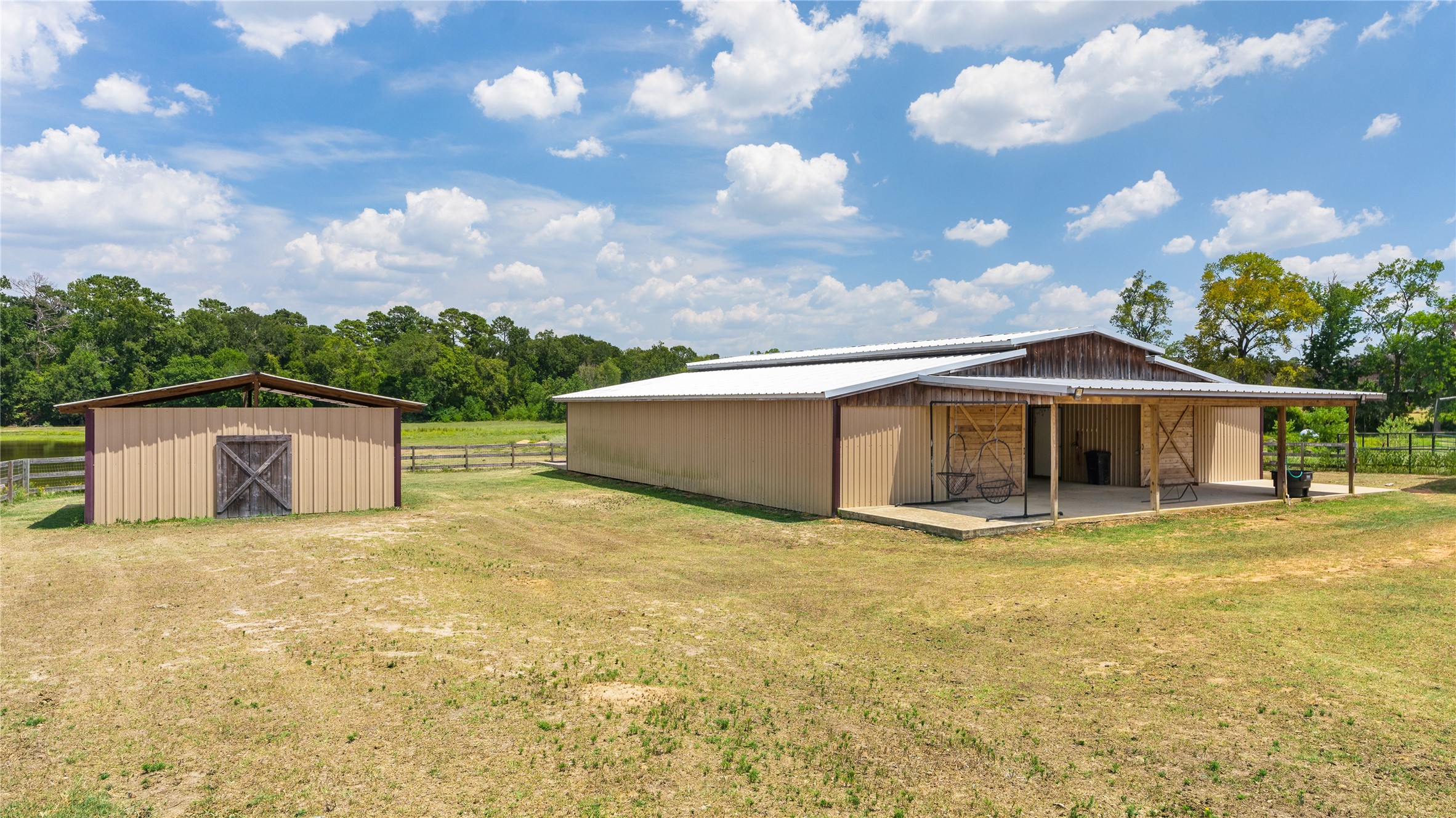 41115 Community Road Magnolia, TX 77354 - Photo 13 of 28 a view of a house with a yard