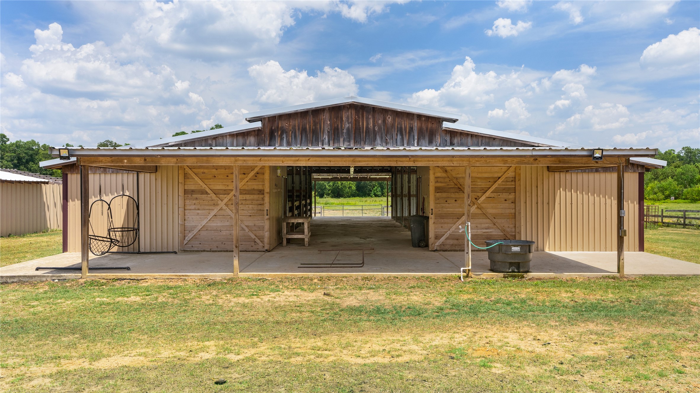 41115 Community Road Magnolia, TX 77354 - Photo 14 of 28 a view of a house with a backyard