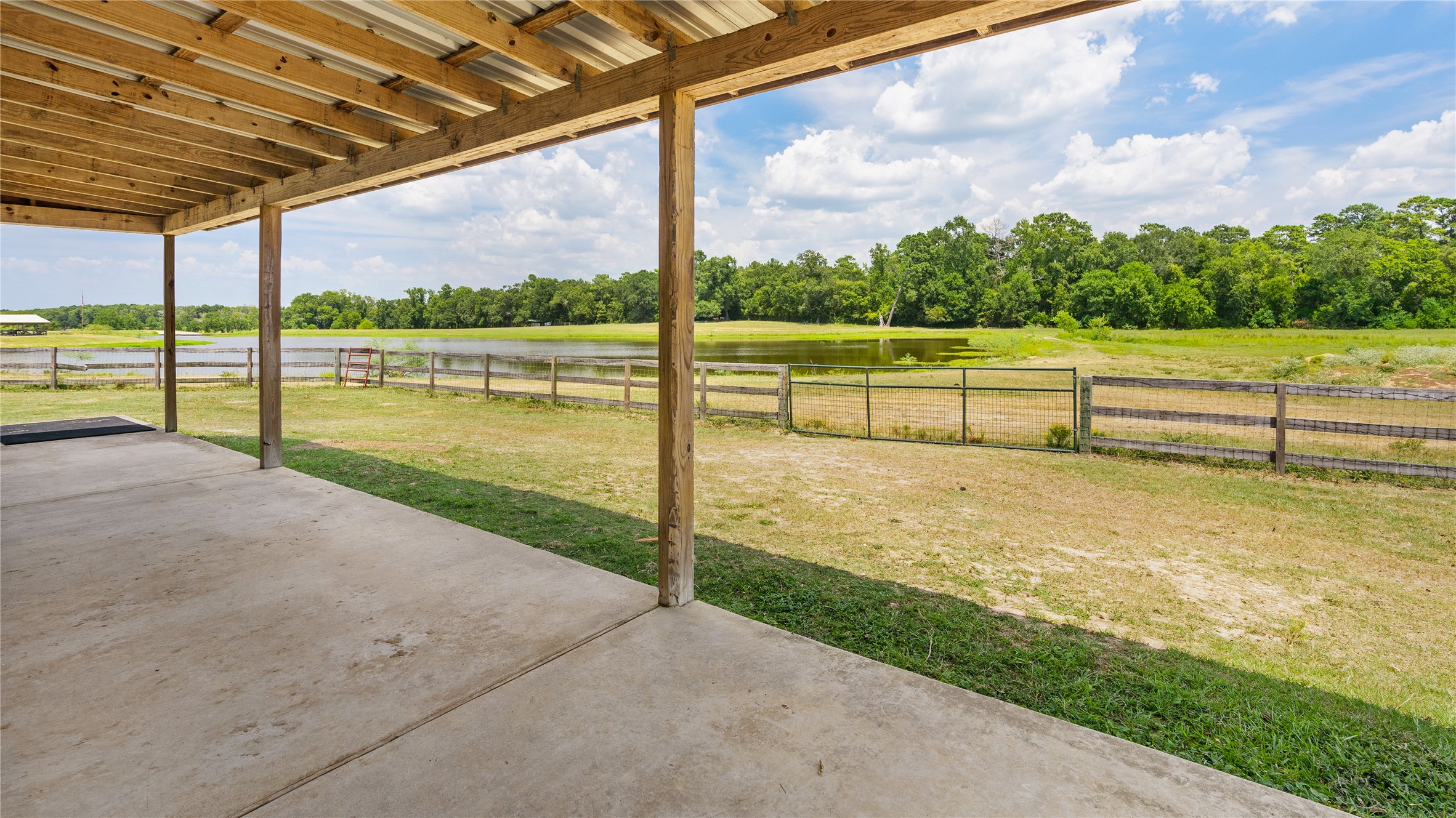 41115 Community Road Magnolia, TX 77354 - Photo 16 of 28 a view of a garden with an outdoor seating