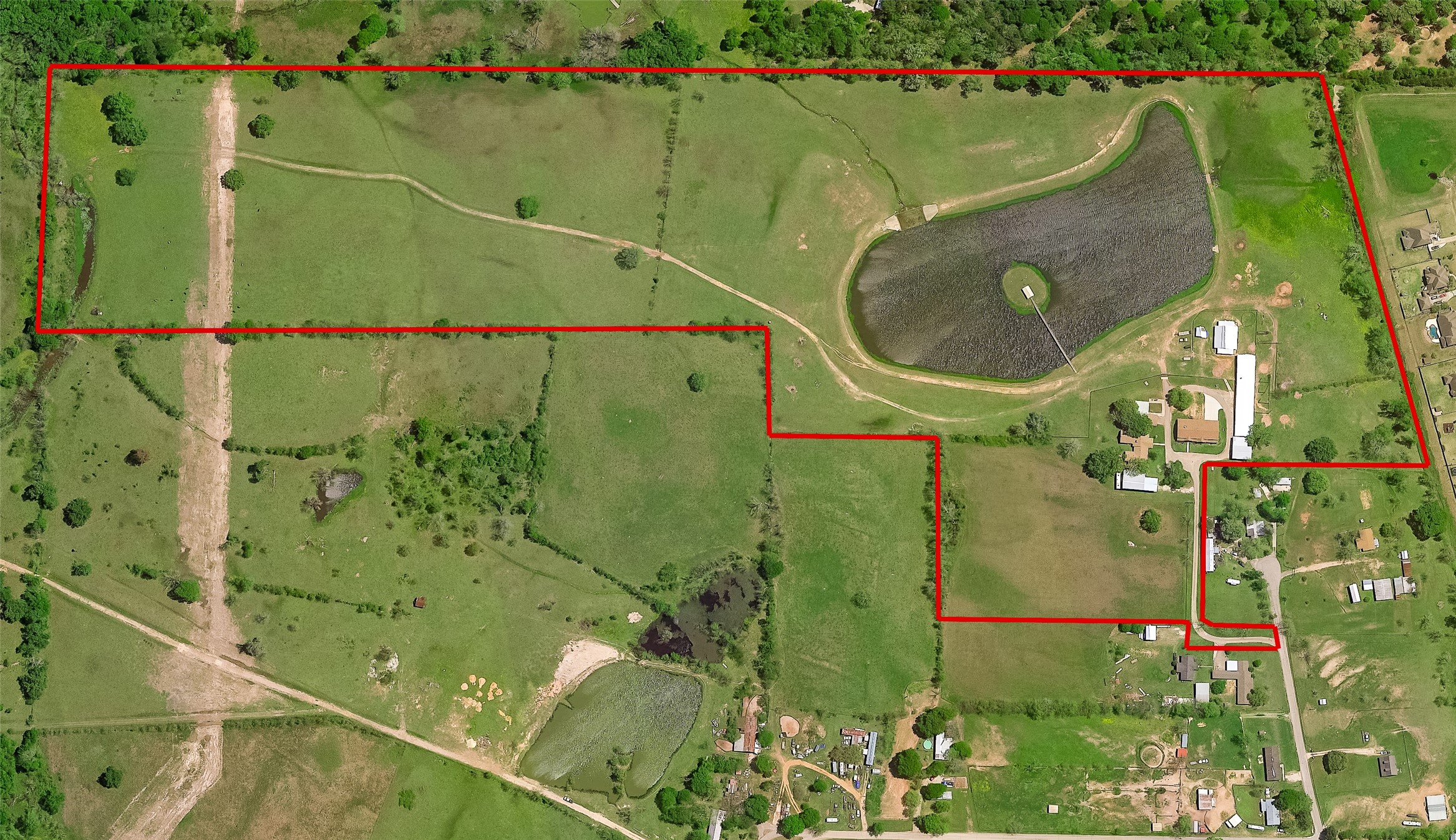 41115 Community Road Magnolia, TX 77354 - Photo 2 of 28 an aerial view of a houses with swimming pool