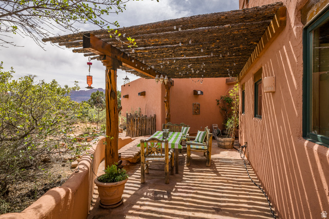 3617 Red Rock Drive Moab, UT 84532 - Photo 11 of 79 View of patio / terrace with a pergola and outdoor dining space