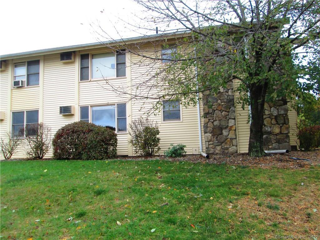 173 Homestead Street, Unit F10 Manchester, CT 06042 - Photo 1 of 1 a front view of a house with a yard