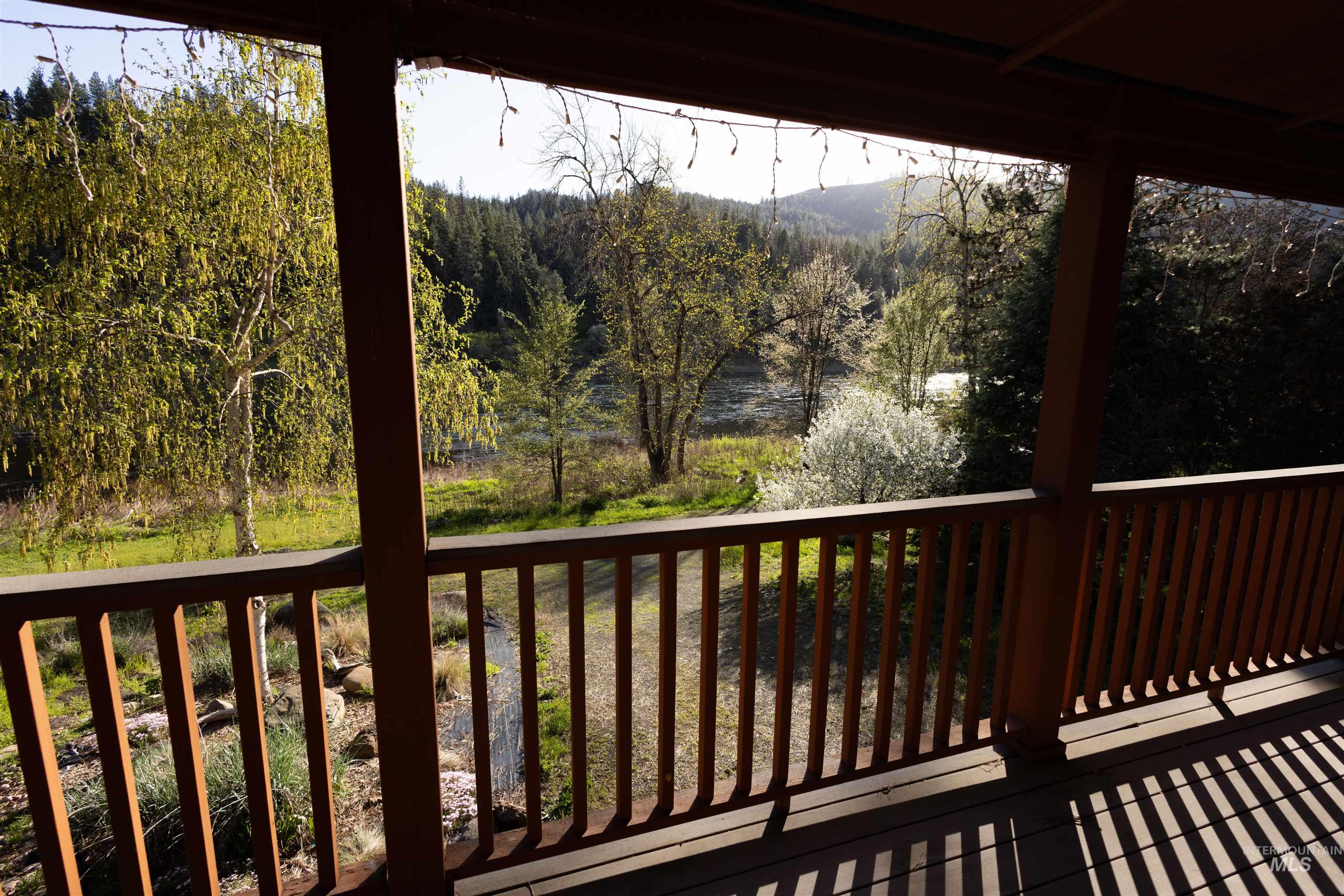 4480 Highway 12 Kamiah, ID 83536 - Photo 15 of 49 Covered outdoor deck with wood-finish flooring and railing