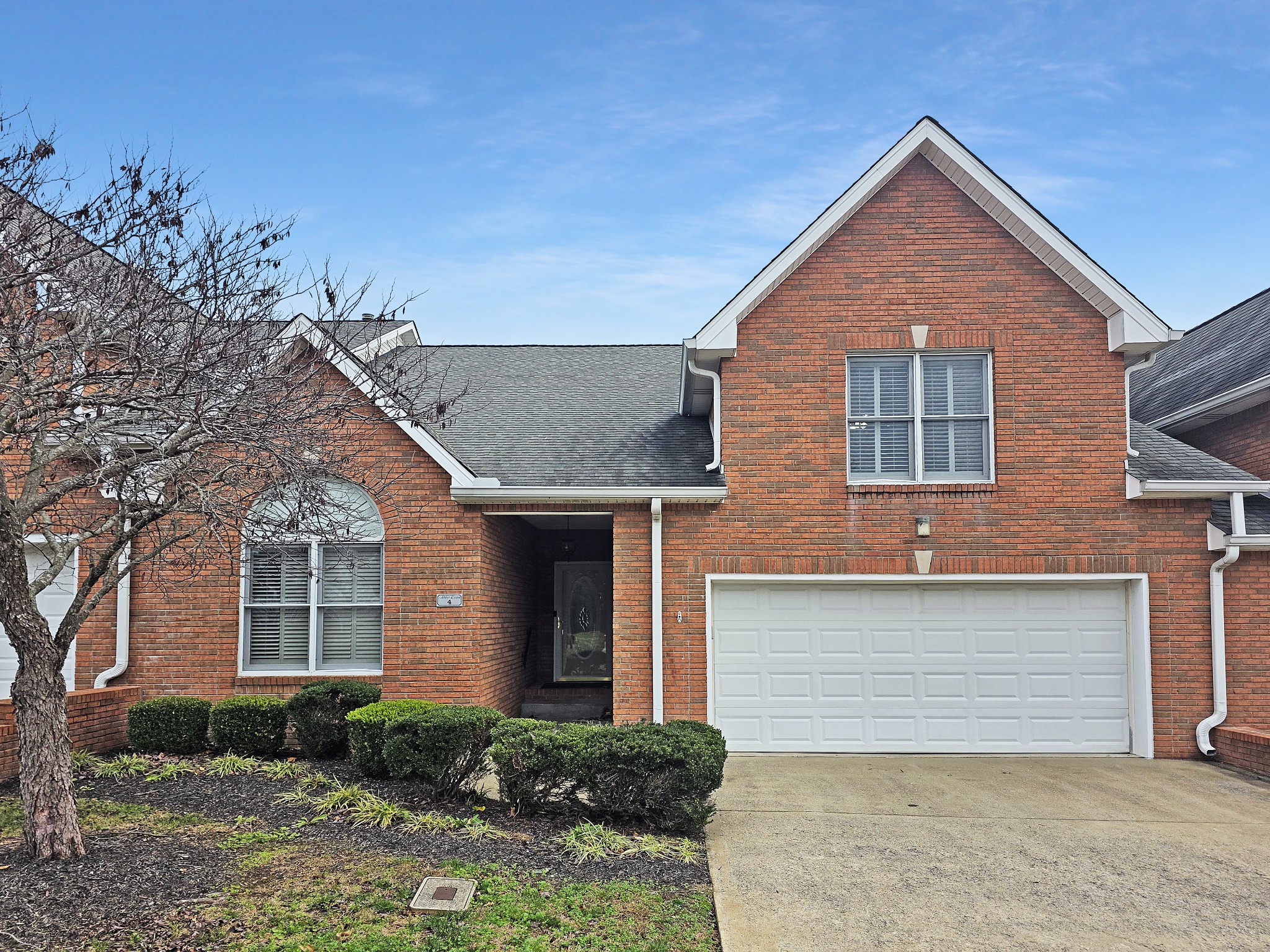 4 Abby Lynn Circle Clarksville, TN 37043 - Photo 1 of 1 a front view of a house with garage and plants