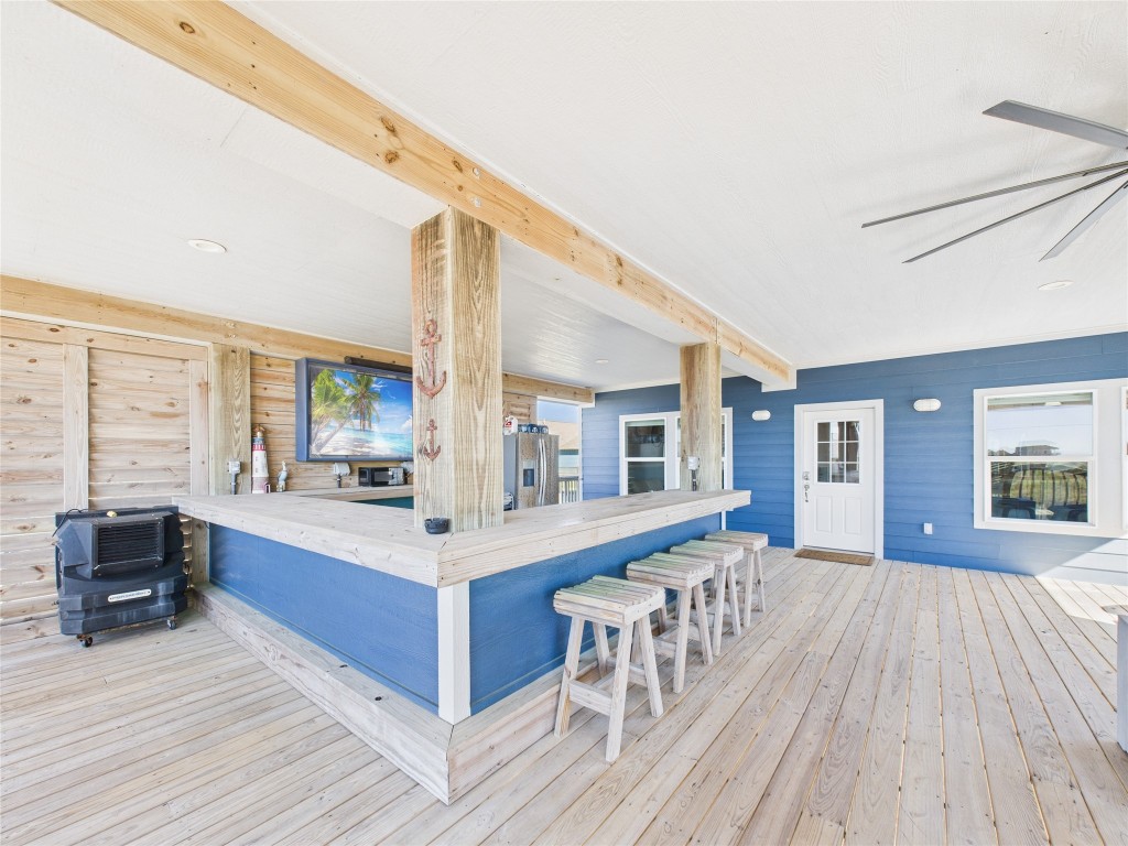 842 Main Street Crystal Beach, TX 77650 - Photo 19 of 45 a living room with furniture and large wooden floor