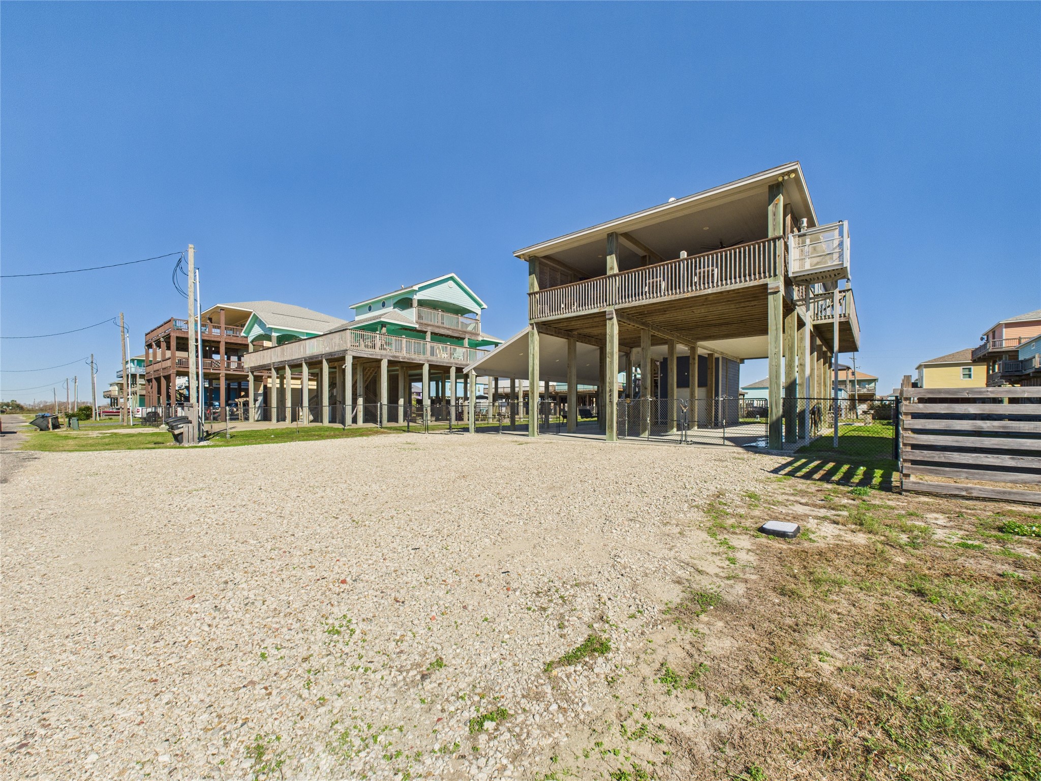 842 Main Street Crystal Beach, TX 77650 - Photo 2 of 45 a front view of house with a yard