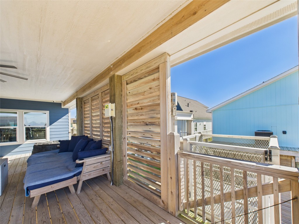 842 Main Street Crystal Beach, TX 77650 - Photo 22 of 45 a living room with furniture and wooden floor