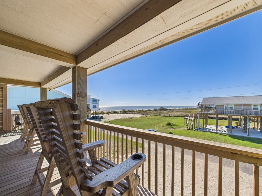 842 Main Street Crystal Beach, TX 77650 - Photo 23 of 45 a view of a balcony with chairs