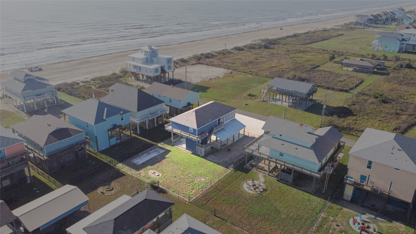 842 Main Street Crystal Beach, TX 77650 - Photo 39 of 45 an aerial view of residential houses with outdoor space