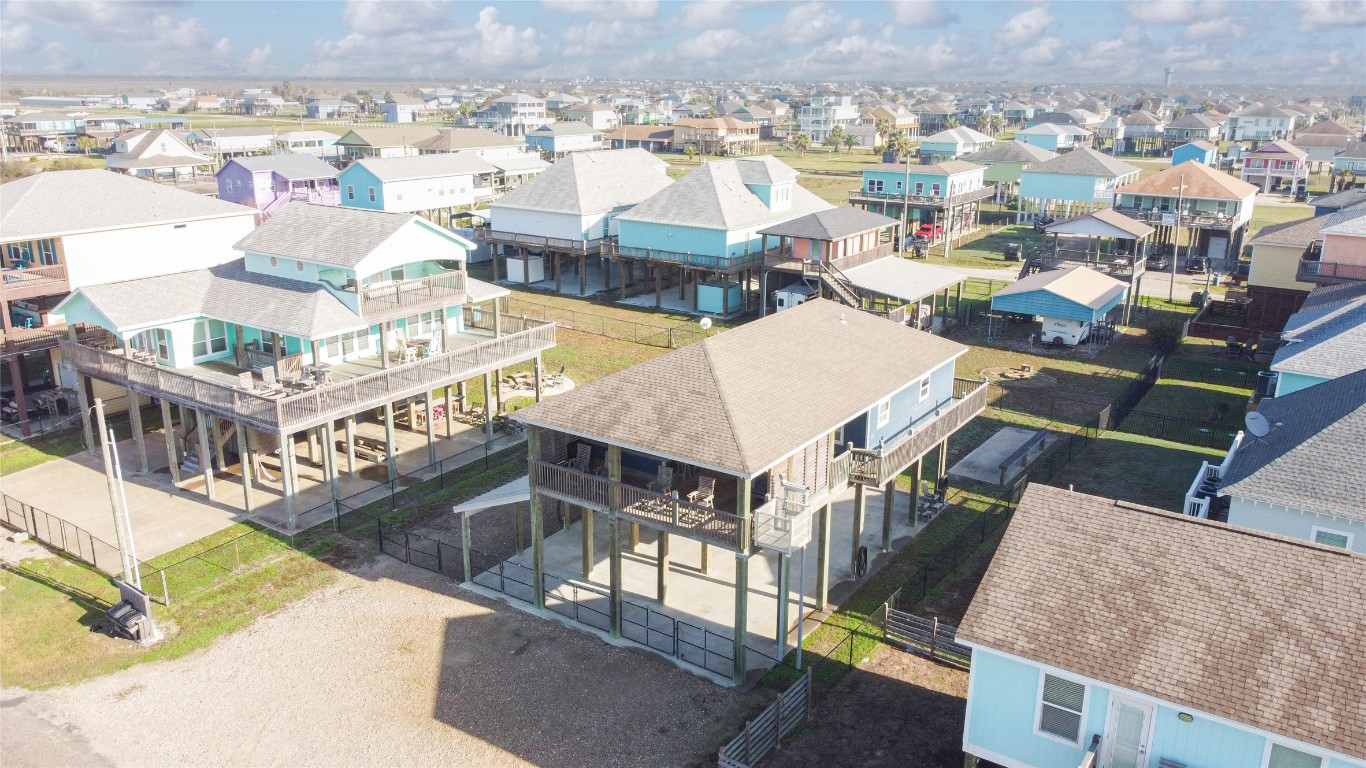 842 Main Street Crystal Beach, TX 77650 - Photo 43 of 45 an aerial view of residential houses with outdoor space