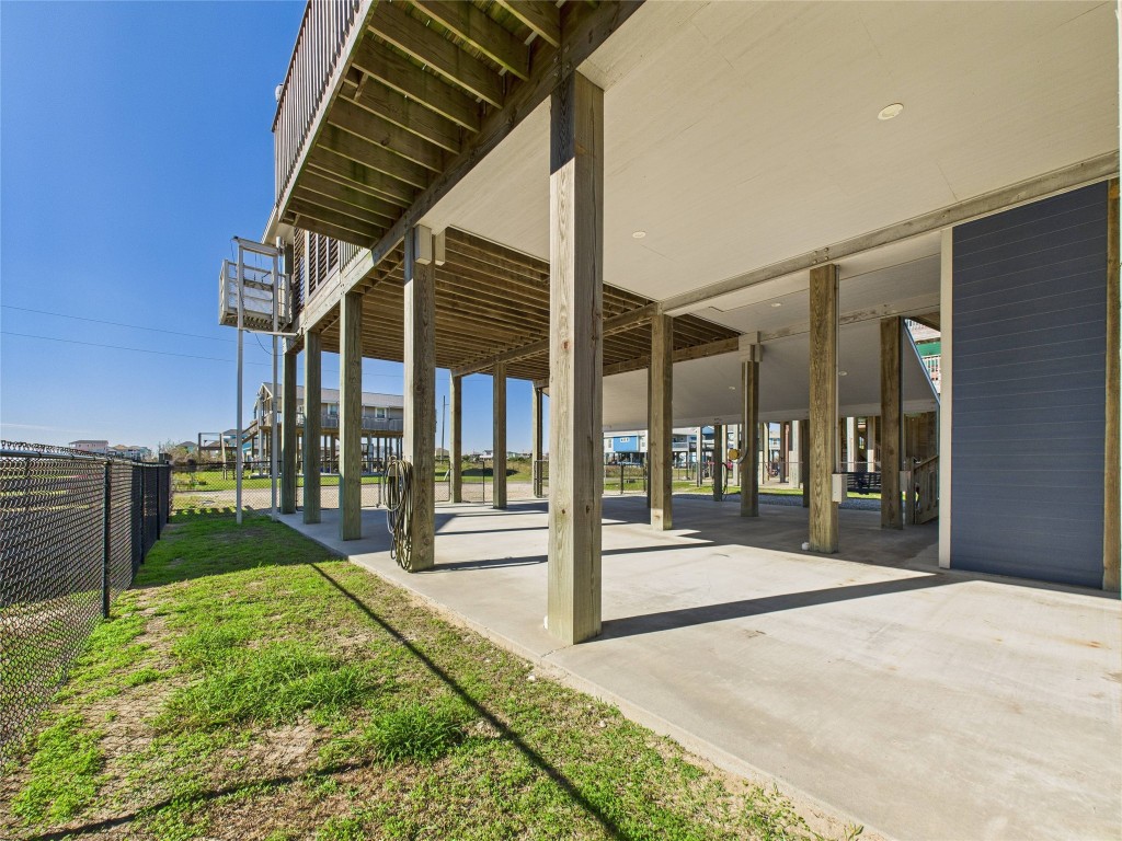 842 Main Street Crystal Beach, TX 77650 - Photo 8 of 45 a view of a house with a backyard