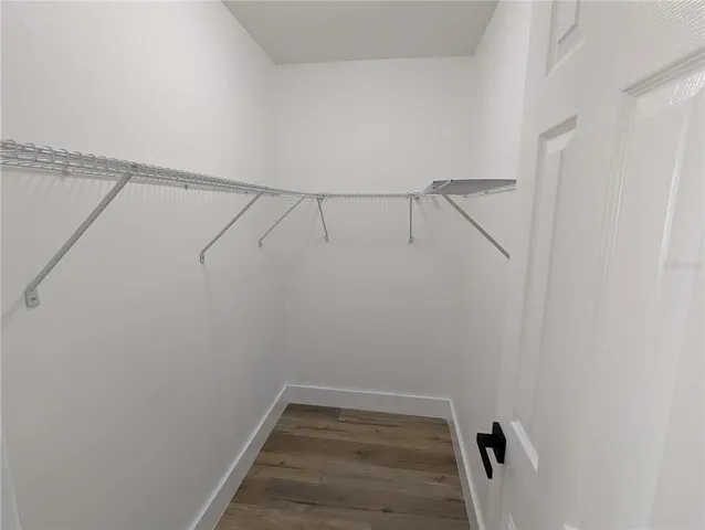 a view of a room with racks on the wall