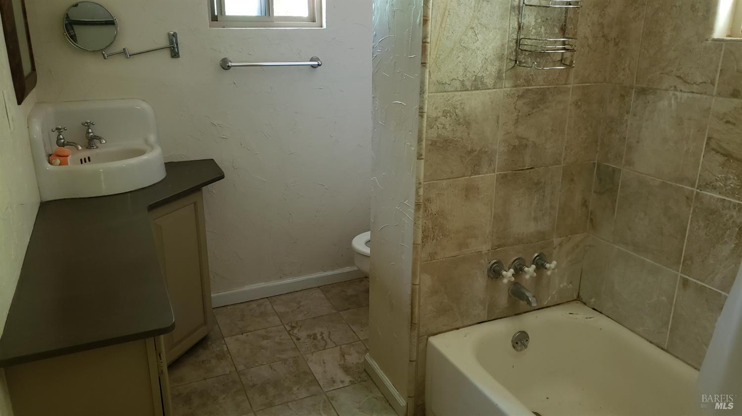 Undisclosed Address Laytonville, CA 95454 - Photo 5 of 13 a bathroom with a tub