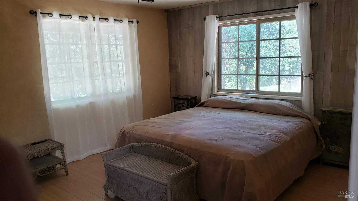 Undisclosed Address Laytonville, CA 95454 - Photo 6 of 13 a bedroom with a bed and a window