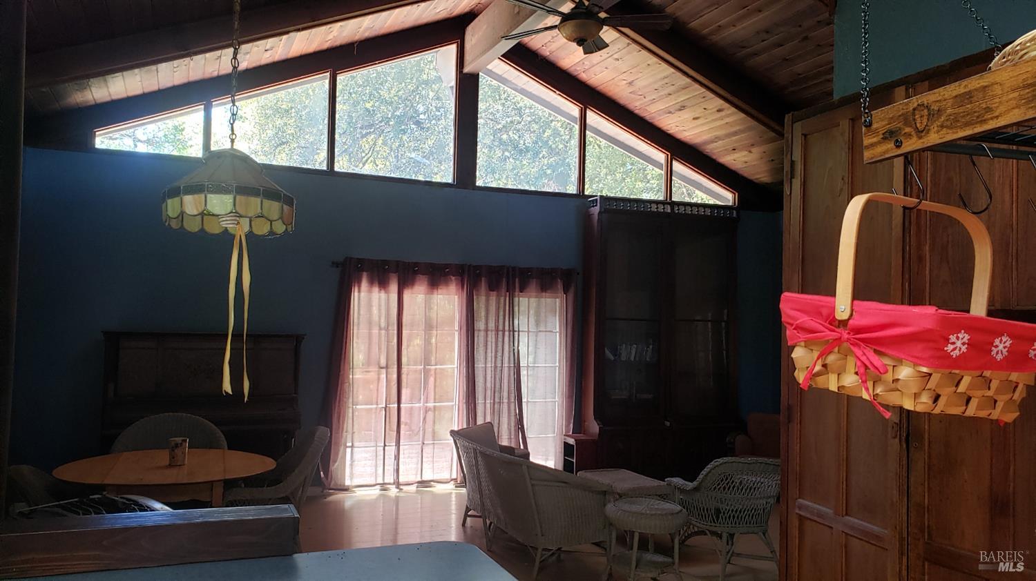 Undisclosed Address Laytonville, CA 95454 - Photo 8 of 13 a living room with furniture and a window