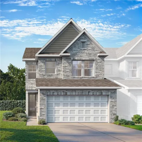 a house view with a garden space