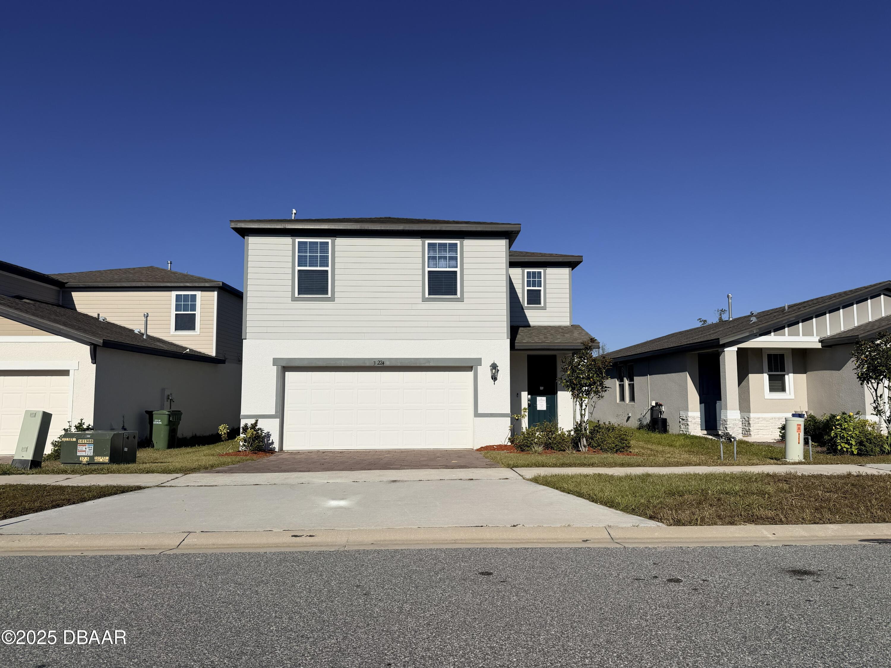 30224 Armenia Road Leesburg, FL 34748 - Photo 1 of 29 a front view of a house with a yard