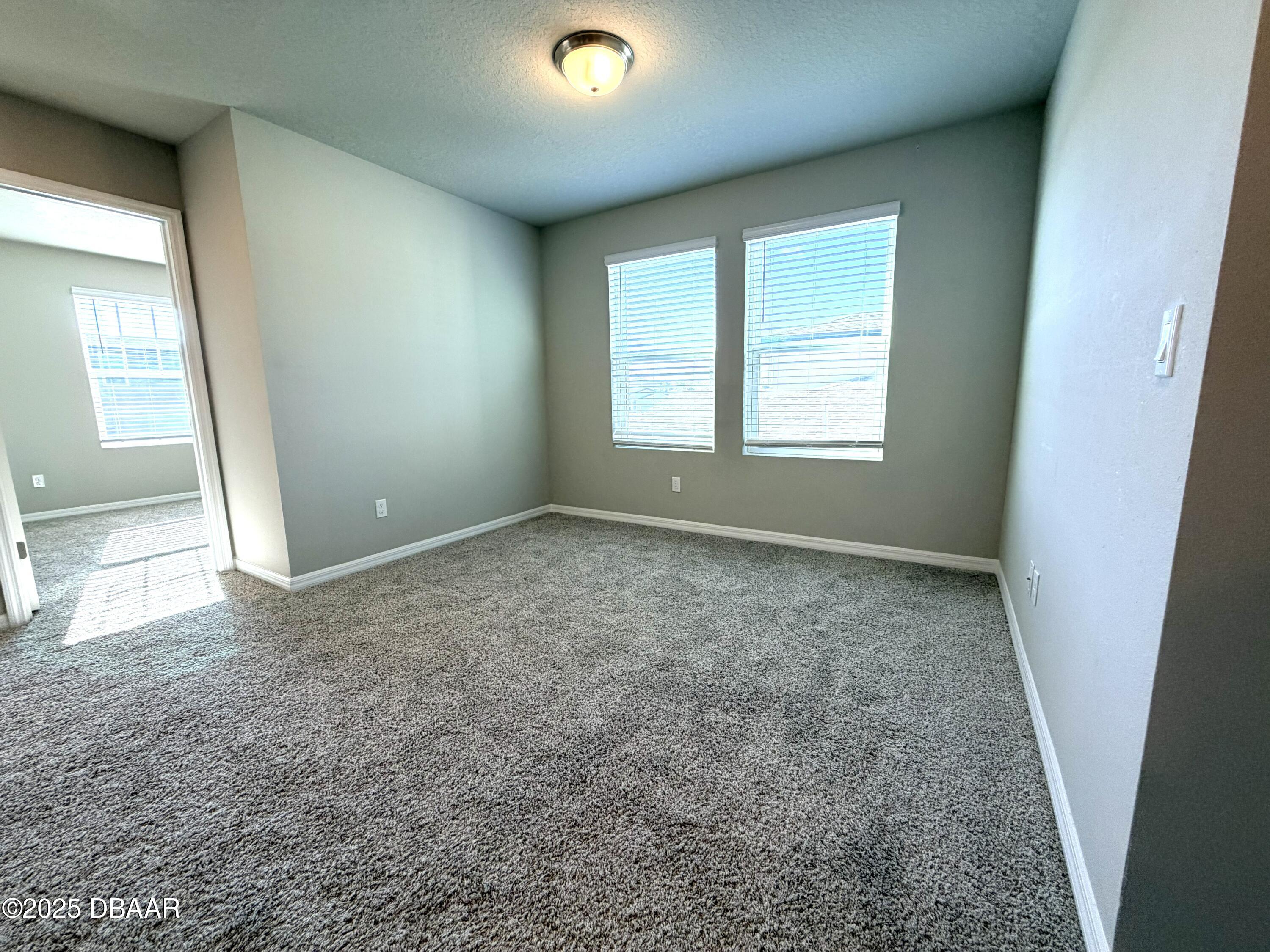 30224 Armenia Road Leesburg, FL 34748 - Photo 10 of 29 an empty room with a window