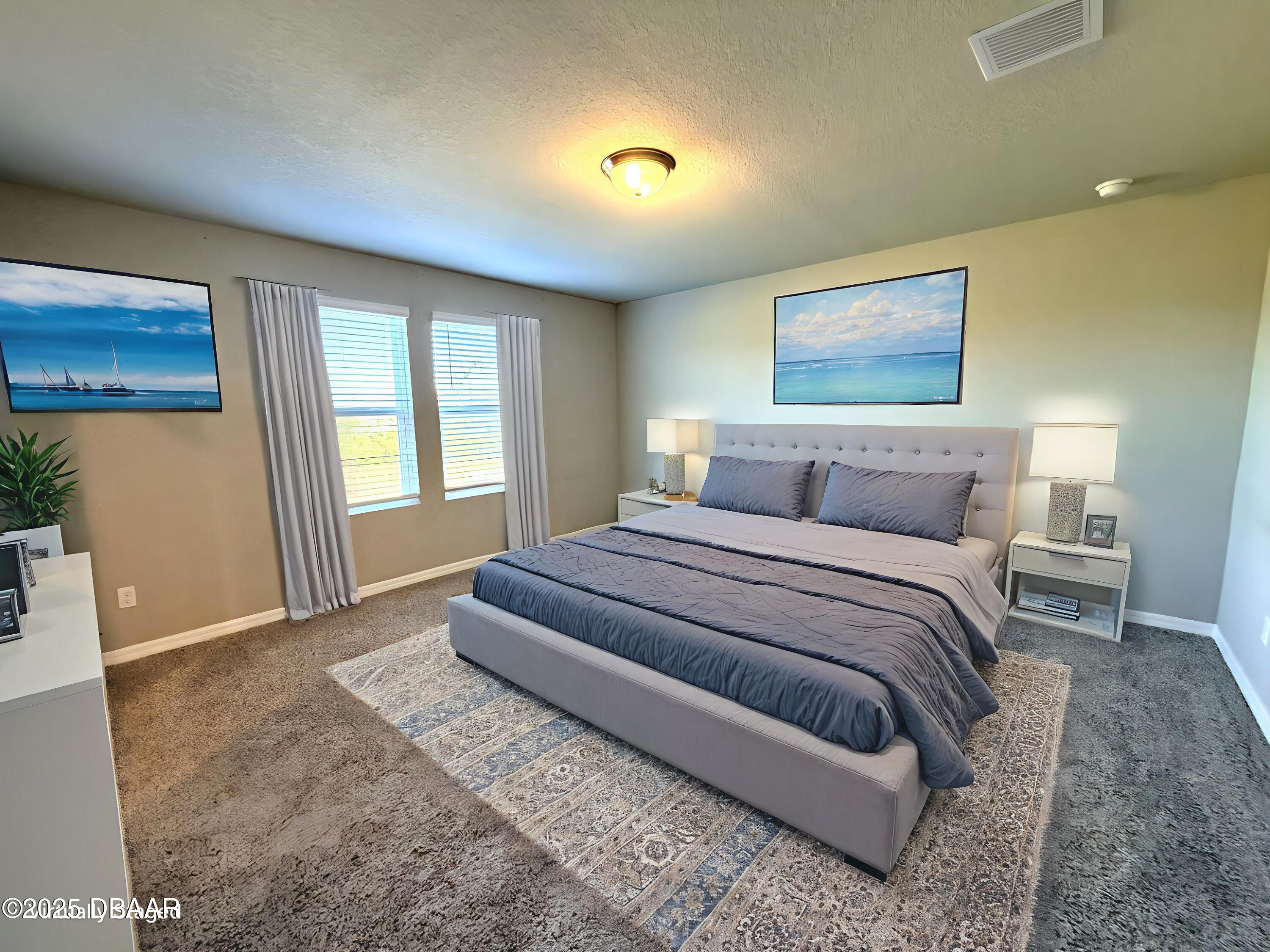 30224 Armenia Road Leesburg, FL 34748 - Photo 12 of 29 a bedroom with a bed and a window
