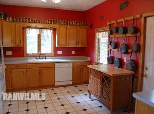 3375 South Rock City Road Ridott, IL 61067 - Photo 4 of 7 a kitchen that has a sink and a stove in it