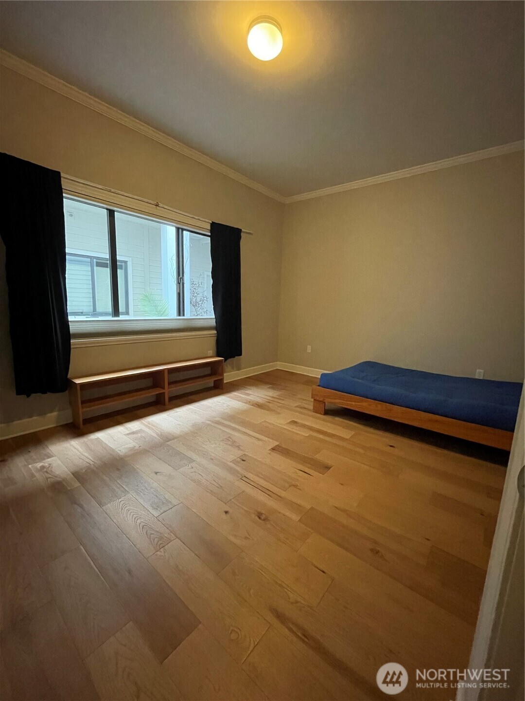 1101 McKenzie Avenue, Unit 206 Bellingham, WA 98225 - Photo 12 of 16 a view of empty room with window and wooden floor