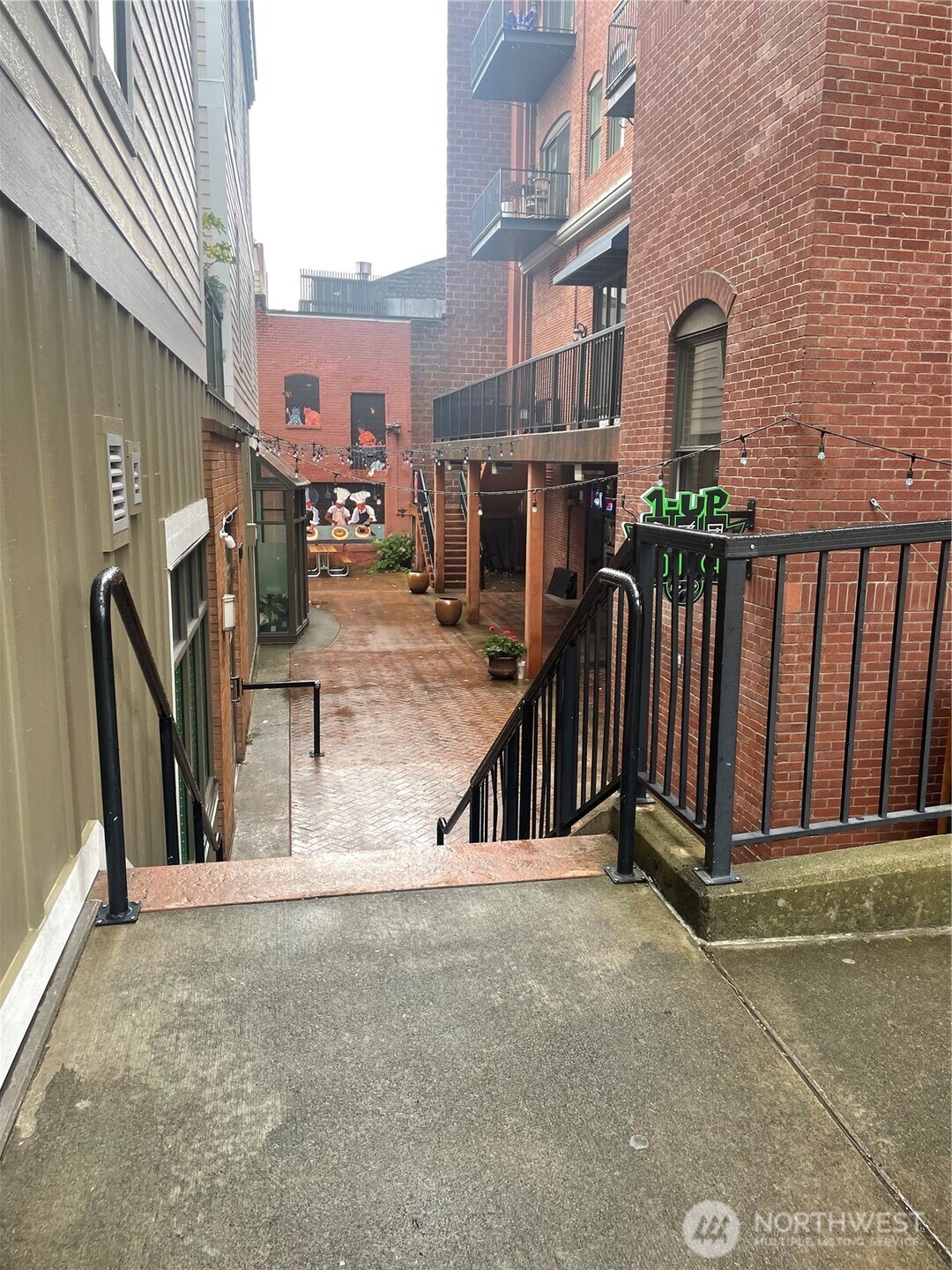 1101 McKenzie Avenue, Unit 206 Bellingham, WA 98225 - Photo 4 of 16 a view of a brick house with many windows
