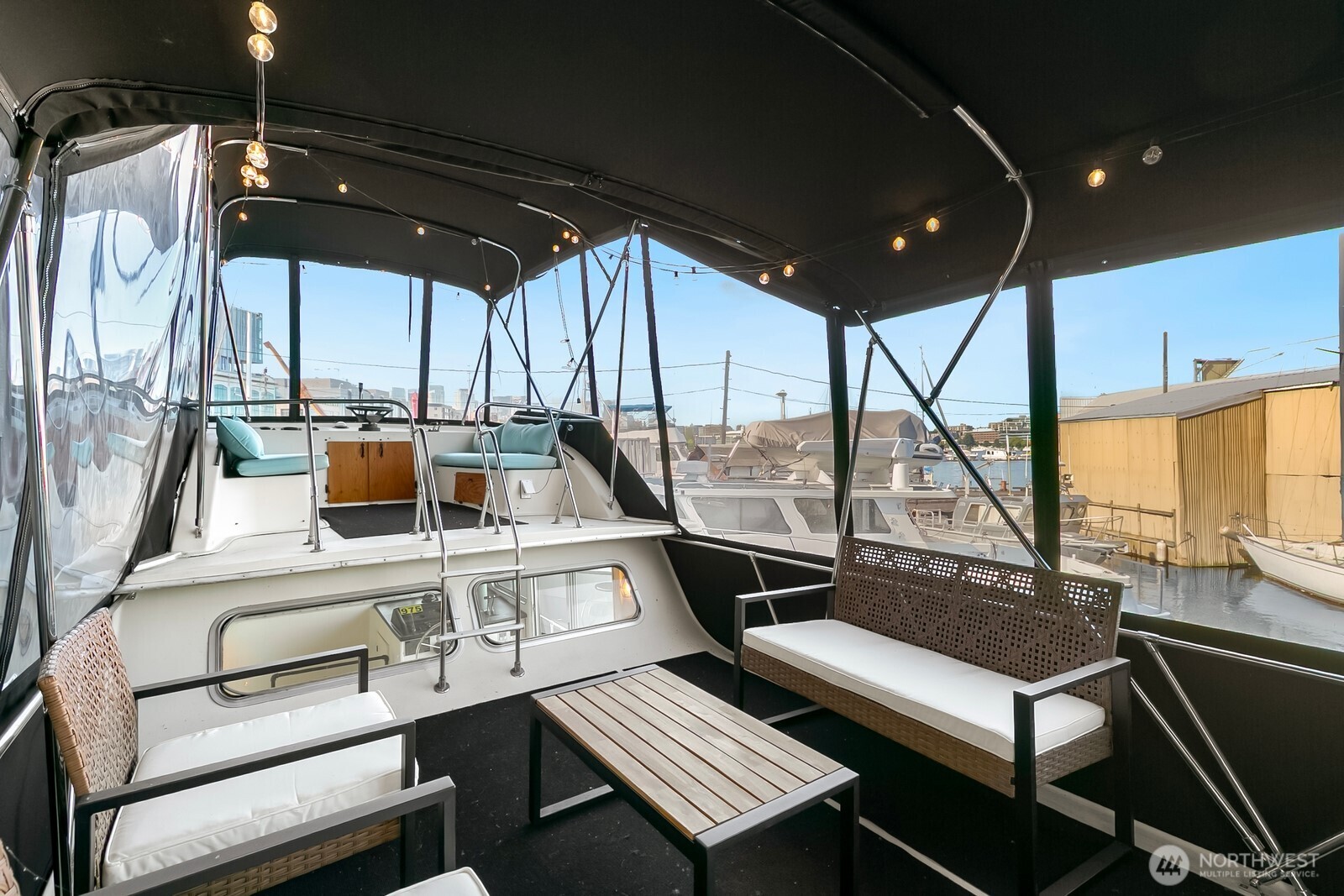 1325 Fairview Avenue North Seattle, WA 98109 - Photo 15 of 23 a view of a chairs and table in a balcony