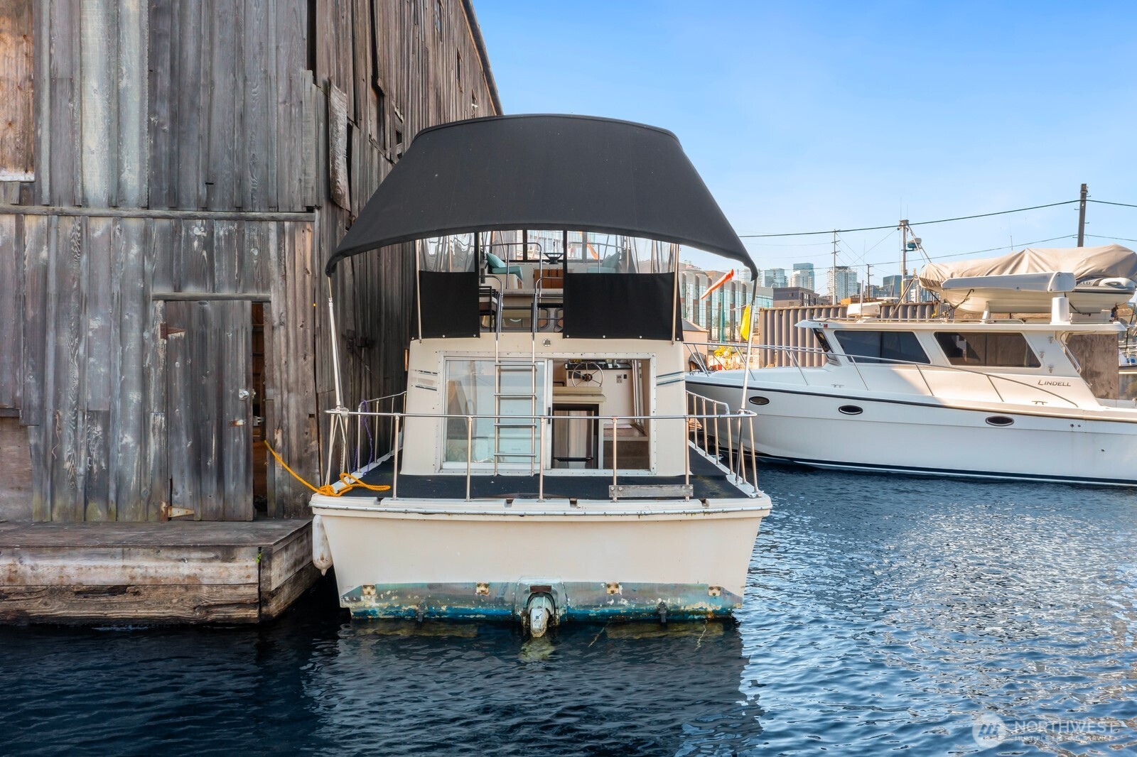 1325 Fairview Avenue North Seattle, WA 98109 - Photo 20 of 23 a view of a balcony with chairs and wooden floor