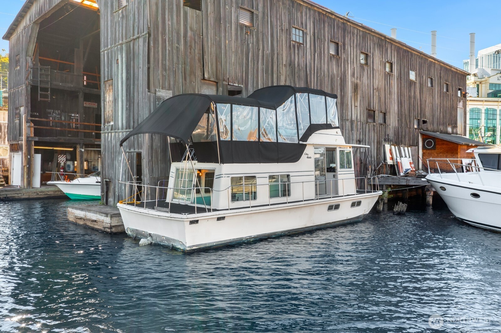 1325 Fairview Avenue North Seattle, WA 98109 - Photo 21 of 23 a white building that has a tree in front of it